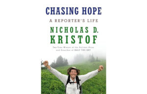The book cover for Chasing Hope, by Nicholas D. Kristof. A man stands, smiling, with his arms outstretched.