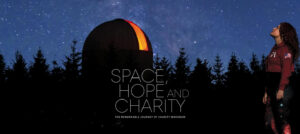 And observatory and the night sky. The words Space, Hope and Charity are printed.
